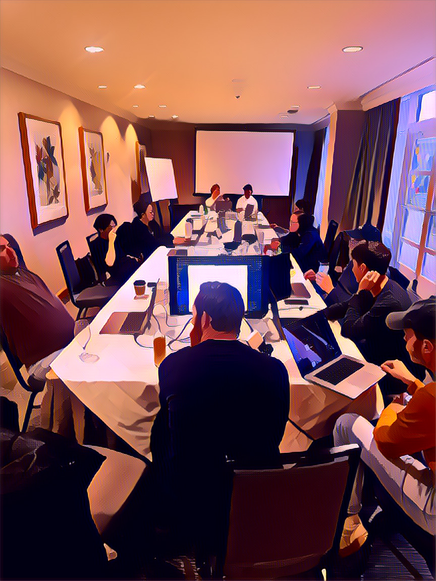 The FICO product design team in a working session around a conference table